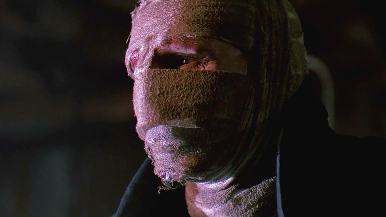 Darkman behind face bandage