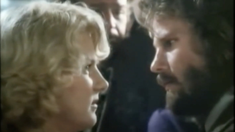 Diana Scarwid and John Savage in Inside Moves