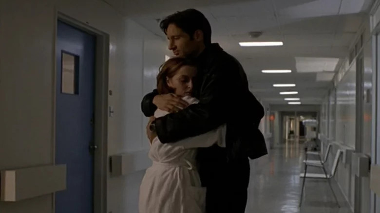 Mulder hugging Scully