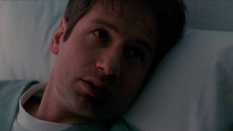 Mulder laying in hospital bed