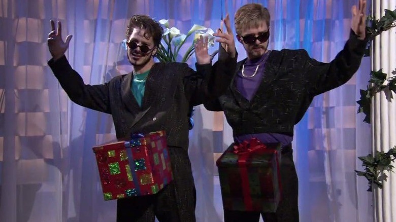 Andy Samberg and Justin Timberlake with presents