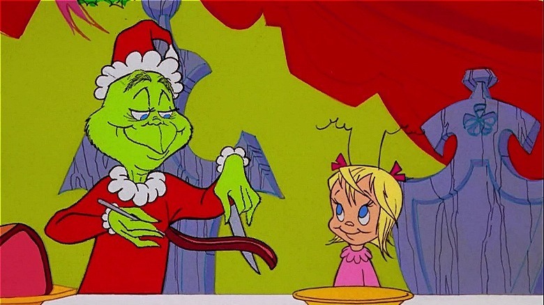 The grinch serving Cindy Lou