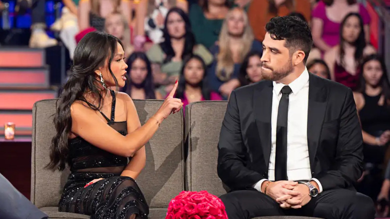 Jenn Tran confronting Devin Strader on the couch at After the Final Rose