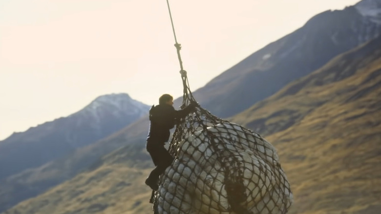 Ethan Hunt climbing cargo net