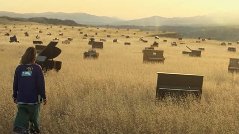 Lizzie sees field full of pianos