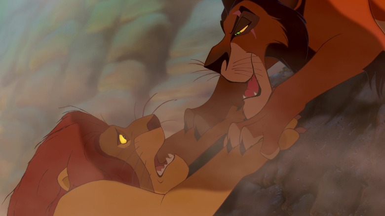 Scar looks down at Mufasa