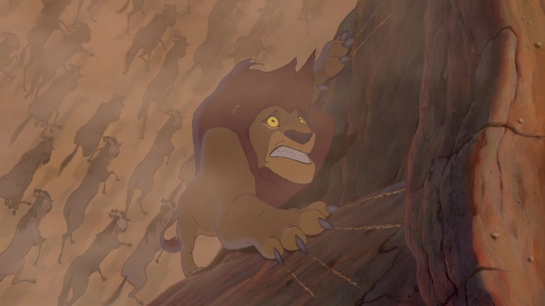 Mufasa grasping onto a cliff