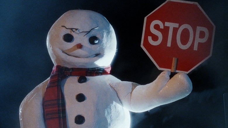 Jack Frost holding a stop sign