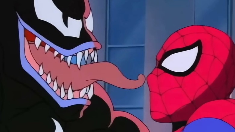 Venom's tongue in Spider-Man's face