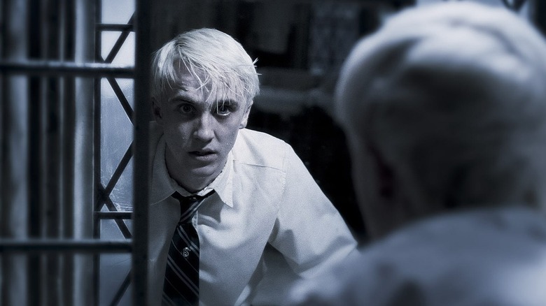 Draco Malfoy in a Hogwarts bathroom