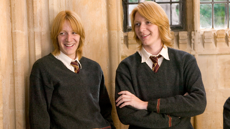 Fred and George laughing