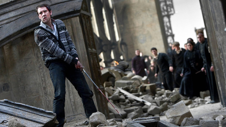 Neville Longbottom with Gryffindor's sword at the Battle of Hogwarts