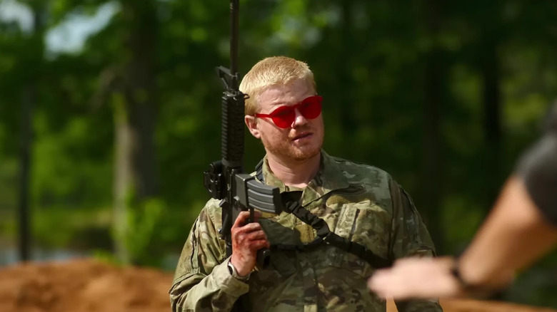 Unnamed soldier holding a gun and wearing red sunglasses in Civil War