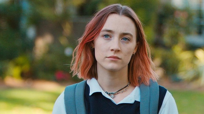 Christine with red hair looking forward in Lady Bird