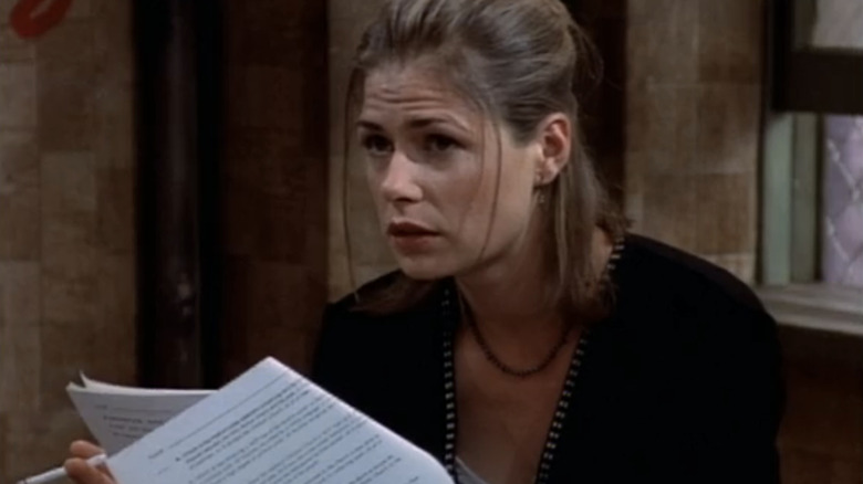 Maura Tierney smokes a cigarette on "NewsRadio"