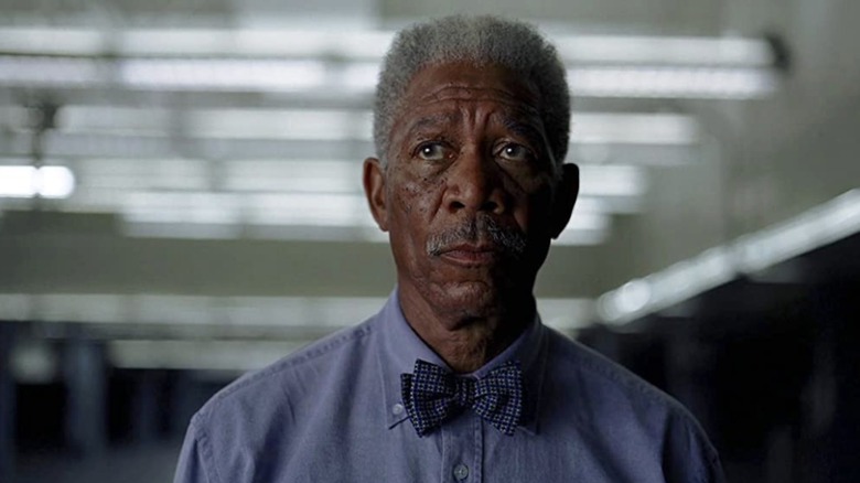 Lucius Fox looking worried