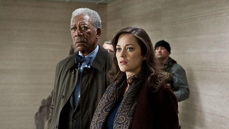 Lucius Fox standing with Miranda