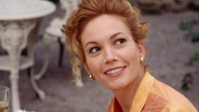 Diane Lane looks up and smiles