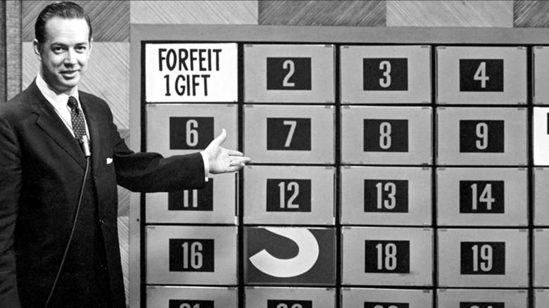 Hugh Downs in front of Concentration game show board