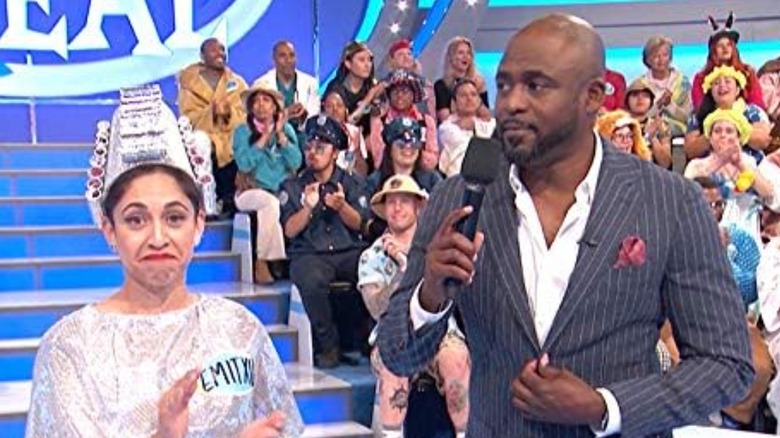 Wayne Brady and a contestant