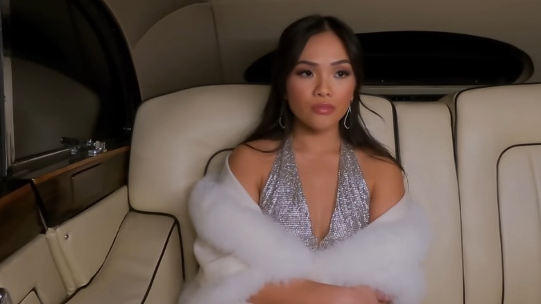 Jenn Tran sitting in the back of a limo on The Bachelorette