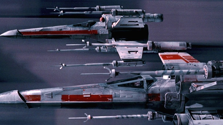 X-wings flying along Death Star