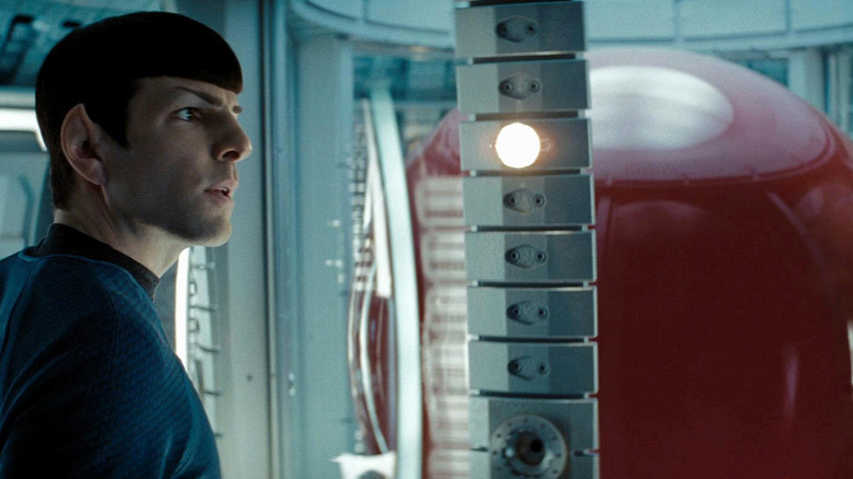 Spock examines the red matter