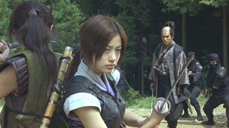 Azumi holds sword