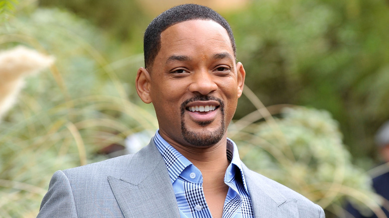 Will Smith smiling outside