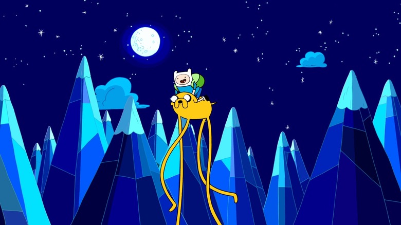 Finn rides on Jake, who walks through mountains at night