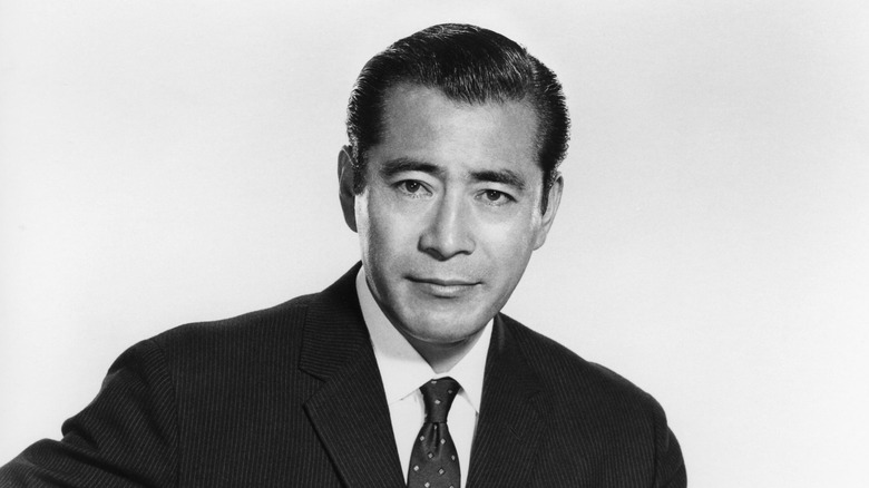 Toshirō Mifune posing in a suit