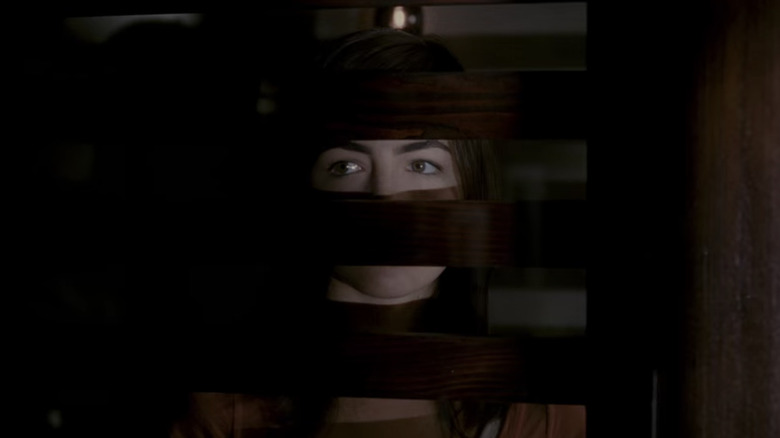 Jill Johnson hiding in "When a Stranger Calls"