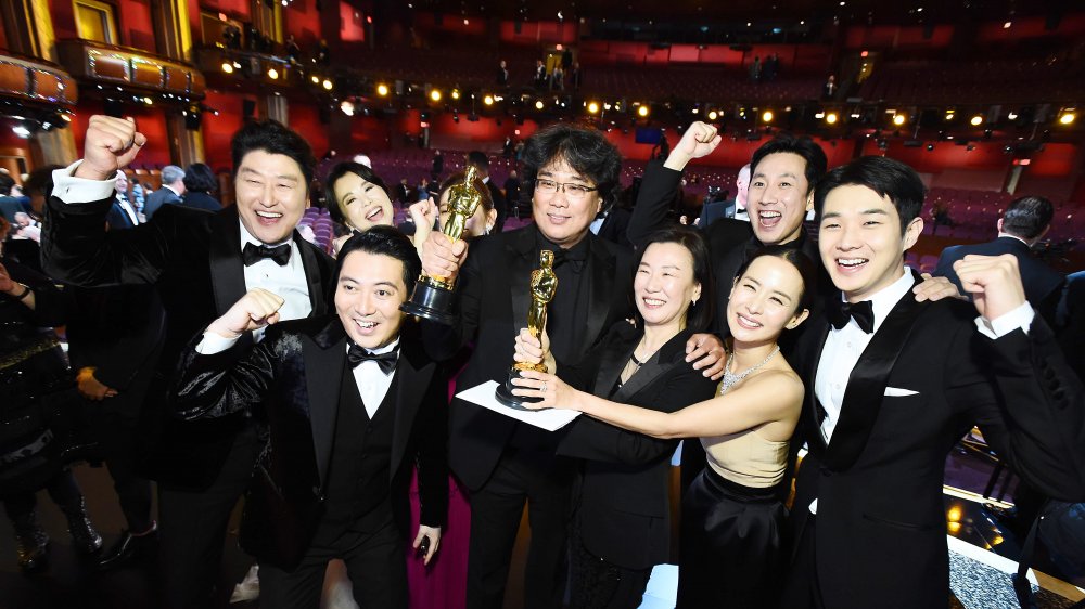 Director Bong Joon-ho with the cast of Parasite at the Academy Awards 2020