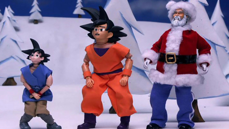 Goku, Gohan, and Santa action figures