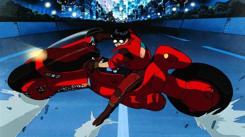 Akira skidding on motorcycle