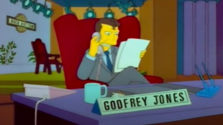 Godfrey at desk