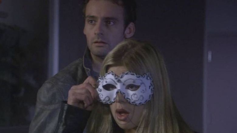 George wearing a mask