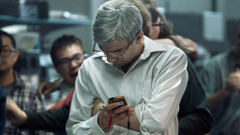 Jay Baruchel looks at his phone in Blackberry