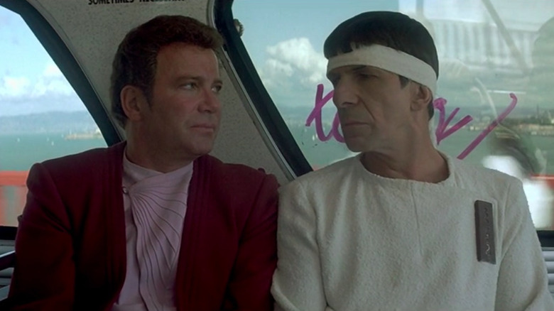 Kirk and Spock look at each other on bus