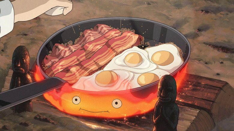 bacon and eggs cooking on Calcifer