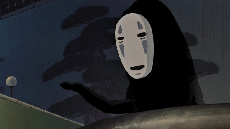 No-Face holds out hand in bathhouse