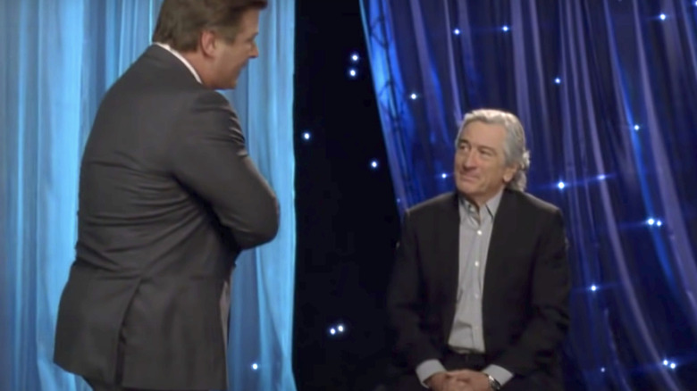 Alec Baldwin talking to Robert de Niro