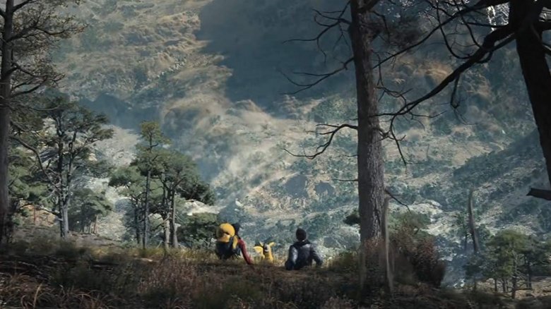 Lucy, Pikachu, and Tim in the forest.