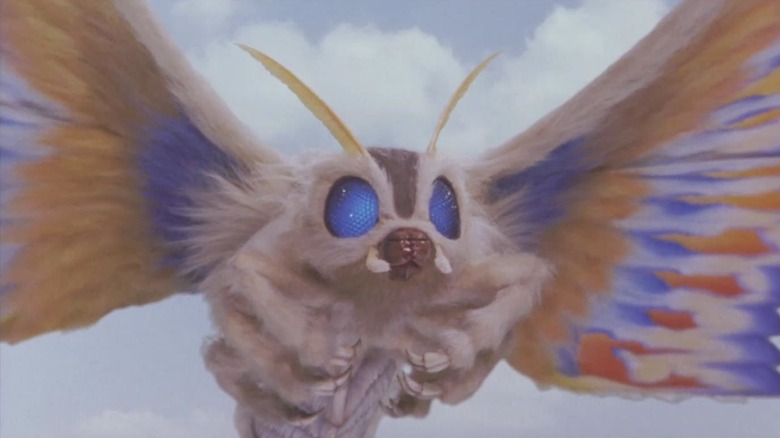 Mothra soars through the sky