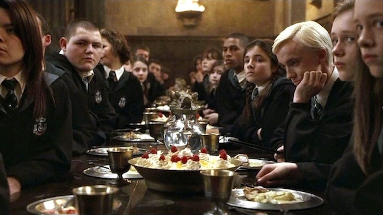 Slytherins sitting at House table