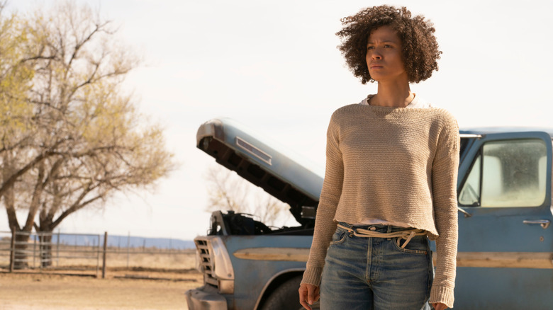 Ruth standing by a truck