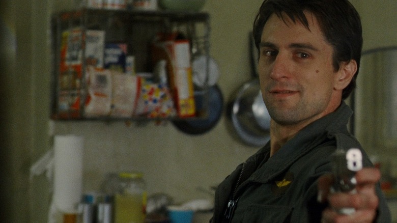 Travis Bickle aiming gun