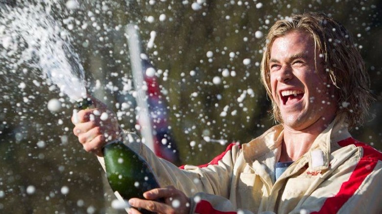 Chris Hemsworth sprays champagne