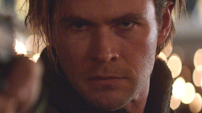 Chris Hemsworth points gun in Blackhat