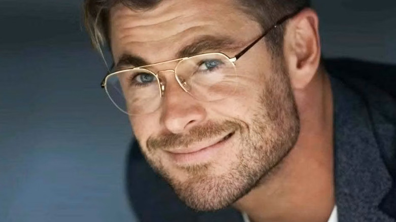 Chris Hemsworth in glasses, smiling